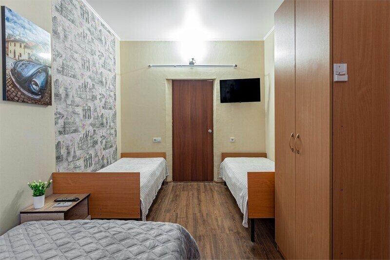 Семейный 4-местный (с 2 односпальными кроватями)