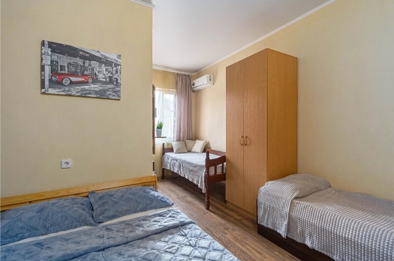 Семейный 4-местный (с 2 односпальными кроватями)