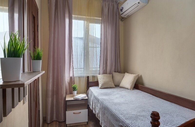 Семейный 4-местный (с 2 односпальными кроватями)