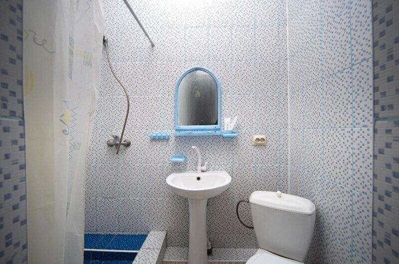 Семейный 4-местный (с 2 односпальными кроватями)