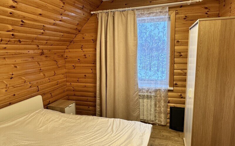 Дом с финской сауной в деревянном стиле