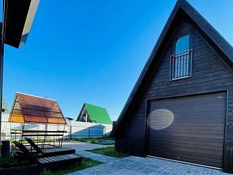 Гостевой дом на берегу залива Волги возле песчаного пляжа