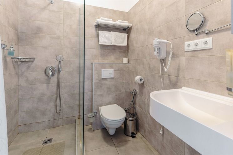 Делюкс 4-местный 1-комнатный (Семейный)