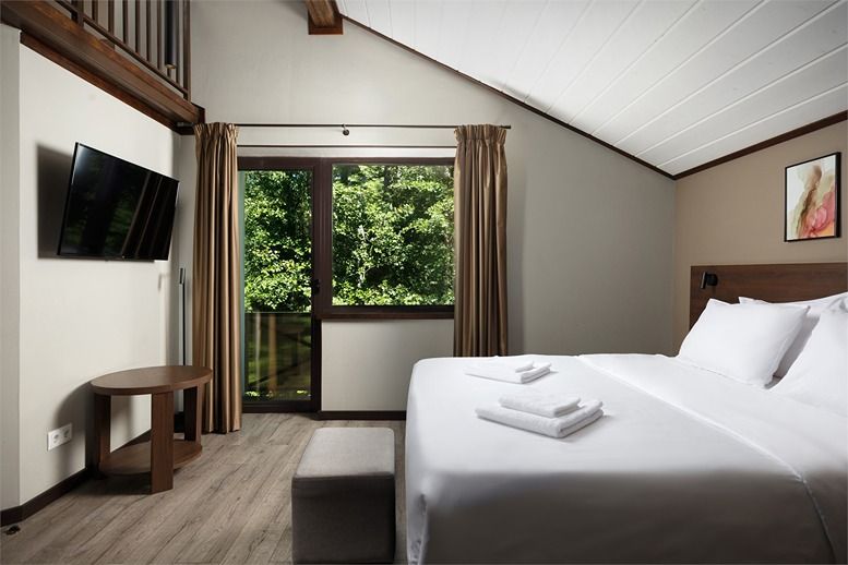 Делюкс Семейный 4-местный (с сауной)