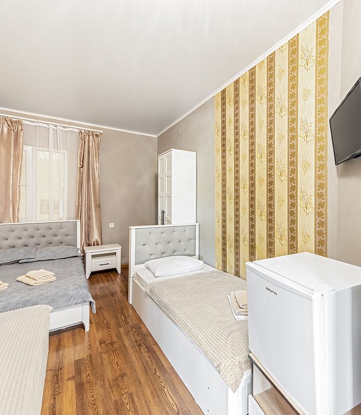 Семейный 4-местный (с двумя односпальными кроватями)