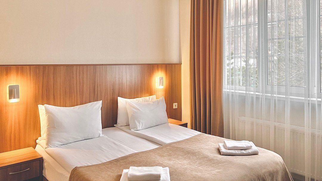 Апартаменты 4-местный 2-комнатный (с балконом)