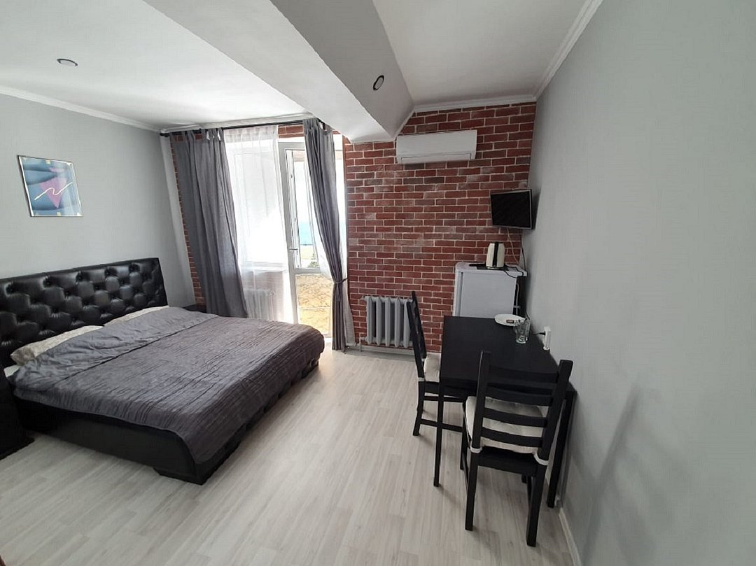 Номер Лофт 4-местный 2-комнатный (с балконом, вид на море)