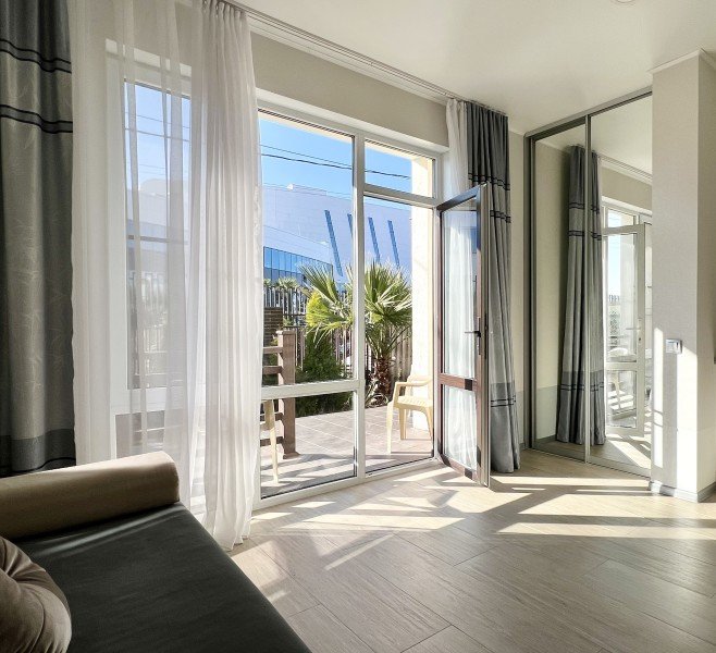 Апартаменты Deluxe 4-местный 2-комнатный (с кухней)