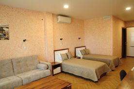 Первая категория с двумя отдельными кроватями с диваном и балконом, База отдыха Озёрная, Печорский район